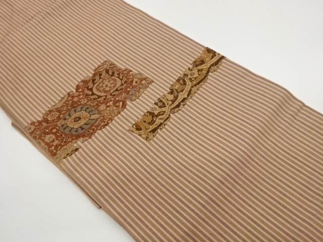 Nagoya obi woven with patchwork stripes and floral arabesque pattern